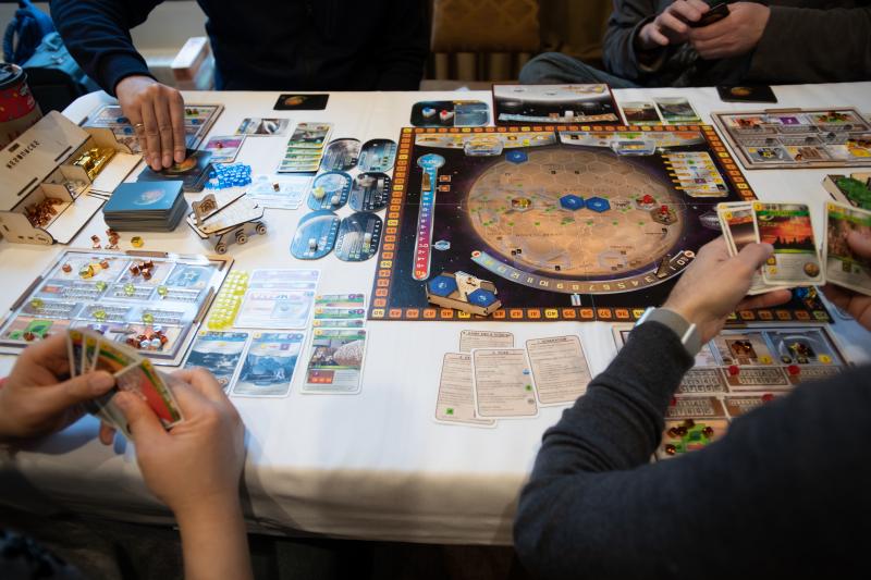Gaming in the main board game hall.